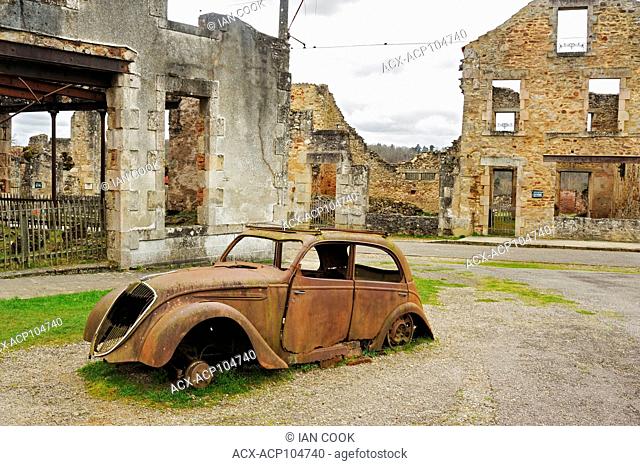 Peugeot 202 car ruins, Oradour-sur-Glane, Haute-Vienne Department, Limousin, France