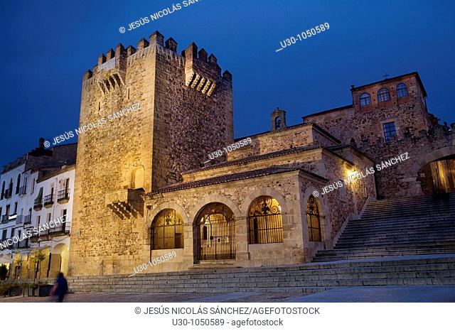 Night view of the Bujaco Tower and Ermita de la Paz in the Main Square of Cáceres  City declared World Heritage by UNESCO  Extremadura  Spain