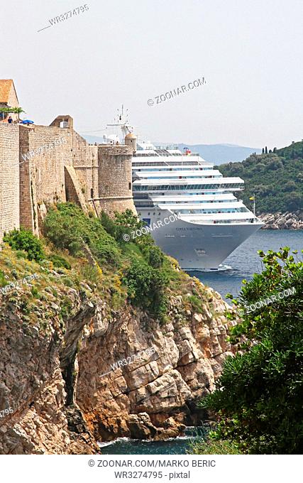 DUBROVNIK, CROATIA - JUNE 13: Costa Fortuna Ship on JUNE 13, 2010. Big Cruise Vessel Passing by Old Walls in Dubrovnik, Croatia