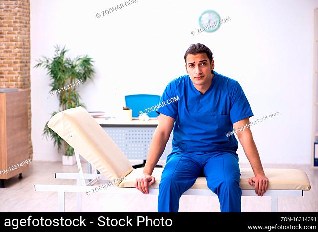 Male doctor working in the clinic