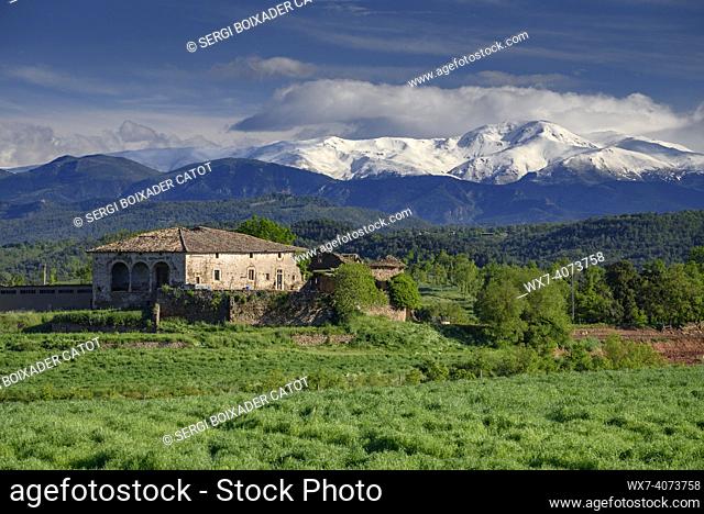 Views from the village of Sant Bartomeu del Grau in spring, with the Pyrenees in the background (Barcelona, Catalonia, Spain)