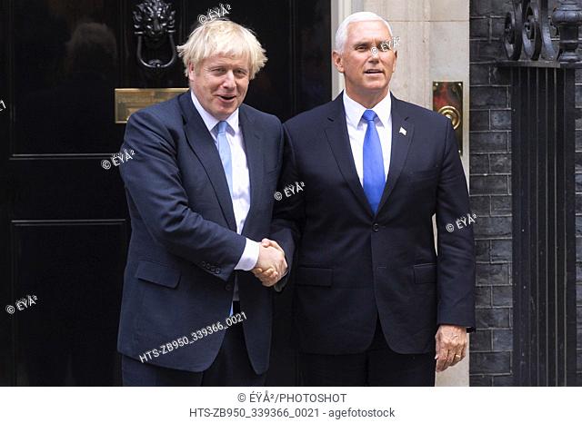 (190905) -- LONDON, Sept. 5, 2019 () -- British Prime Minister Boris Johnson (L) greets U.S. Vice President Mike Pence at 10 Downing Street in London, Britain