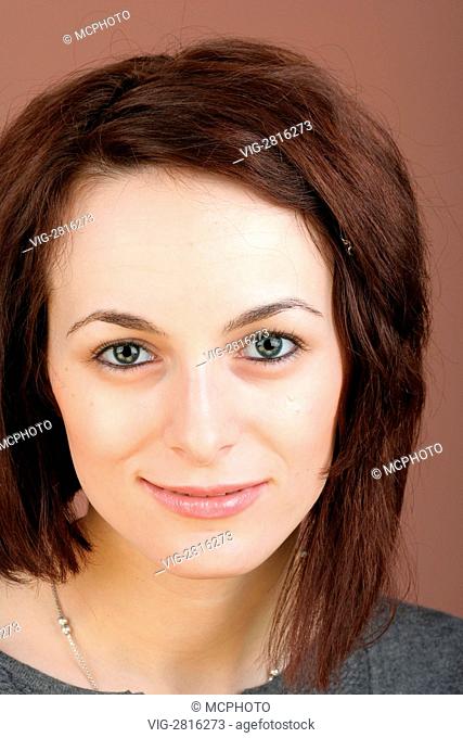 Portrait of a happy beautiful woman with green eyes. - 01/01/2011