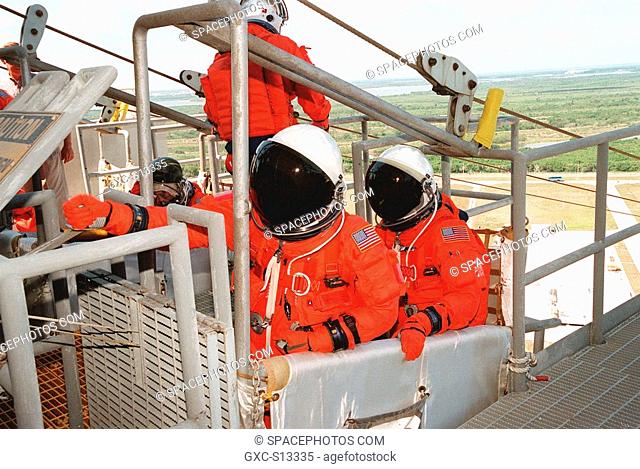 04/29/1999 --- On Launch Pad 39B, STS-96 Commander Kent V. Rominger left and Pilot Rick Douglas Husband right get ready to ride the slidewire basket to the...
