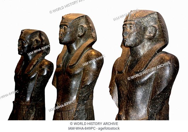 Black granite statues of Pharaoh Sesostris III. 12th dynasty, circa 1850 BC. Originally from Deir el-Bahri, now at the British Museum