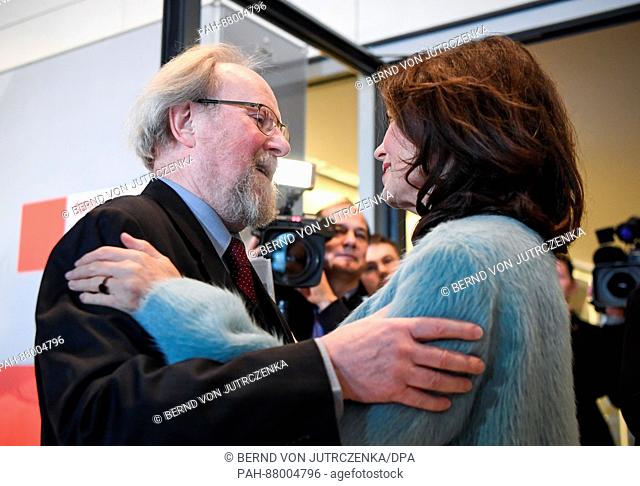 The former president of the German parliament Wolfgang Thierse (L) and the actress Iris Berben arrive for an SPD faction meeting at the Reichstags building in...