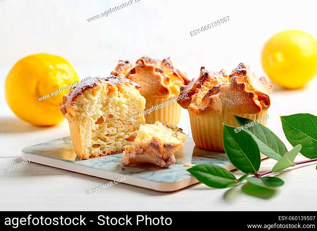 Soffioni - traditional ricotta cheese and lemon cakes. Concept of sweet and easter national pastries