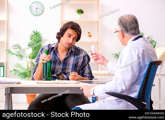 The young male alcoholic visiting old doctor