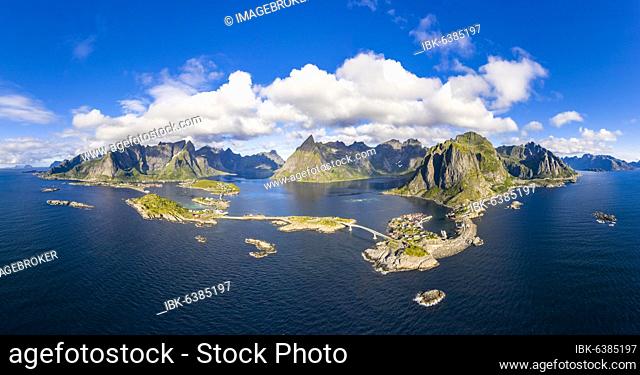 View of islands, fjord and mountains, fishing villages Hamnøy, Sakrisøy and Reine, Reinefjord, Lofoten, Norway, Europe