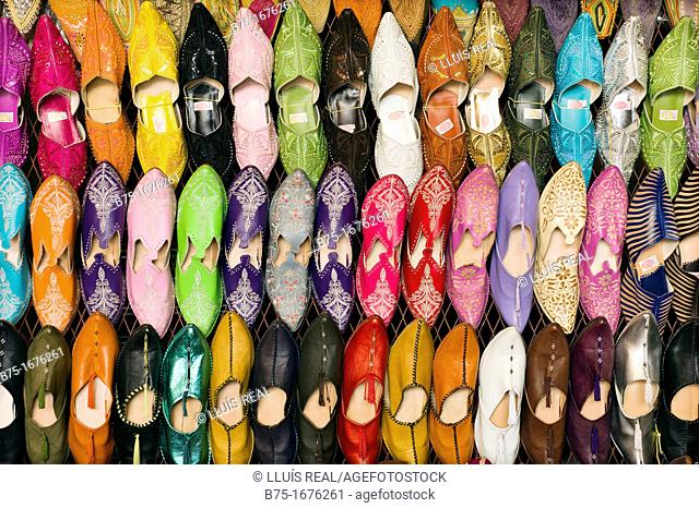 babuchas artesanas de colores en la medina de marrakech, marruecos, craft slippers color in the medina of Marrakech, Morocco