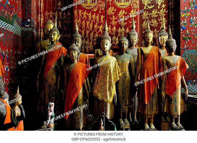 Laos: Buddha images at the back of the Royal Funerary Carriage House, Wat Xieng Thong, Luang Prabang