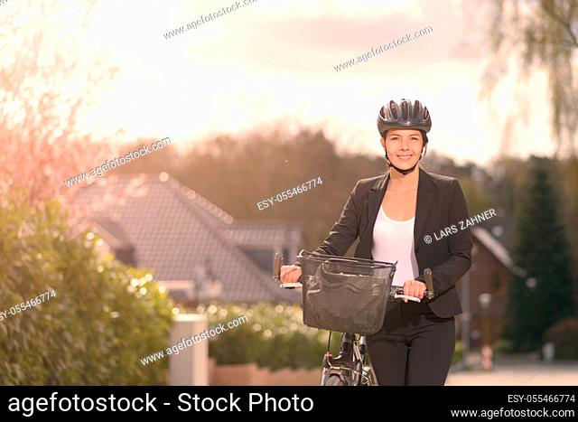 business woman, cycling, cyclist, commuter