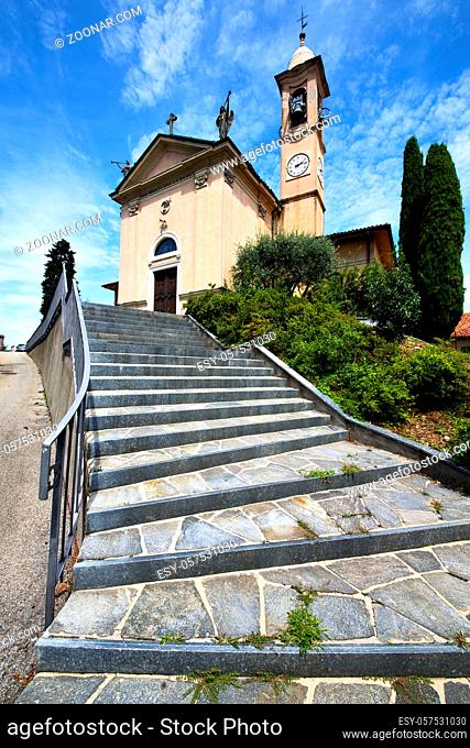 lombardy  in the jerago old  church closed brick tower sidewalk italy