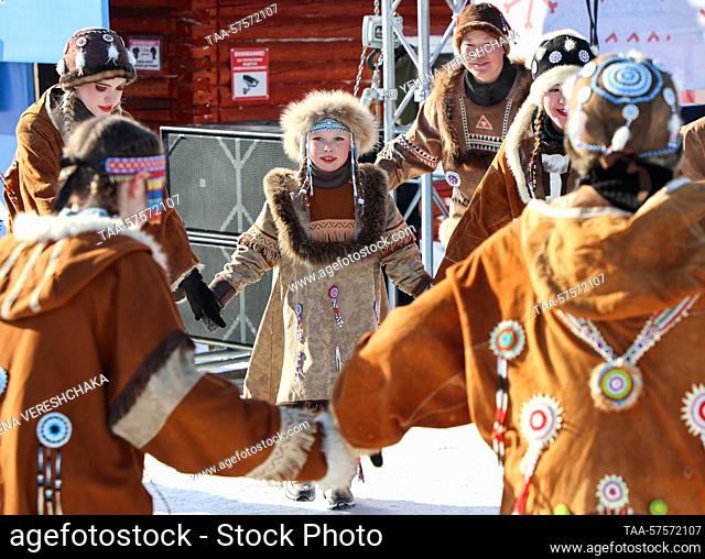 RUSSIA, KAMCHATKA REGION - FEBRUARY 26, 2023: Women enjoy festivities marking Reindeer Breeder Day in the village of Esso, Bystrinsky District