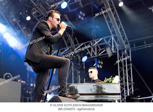 Singer Theo Hutchcraft and pianist Adam Anderson from the British synth-pop band Hurts performing live at Heitere Open Air in Zofingen, Aargau, Switzerland