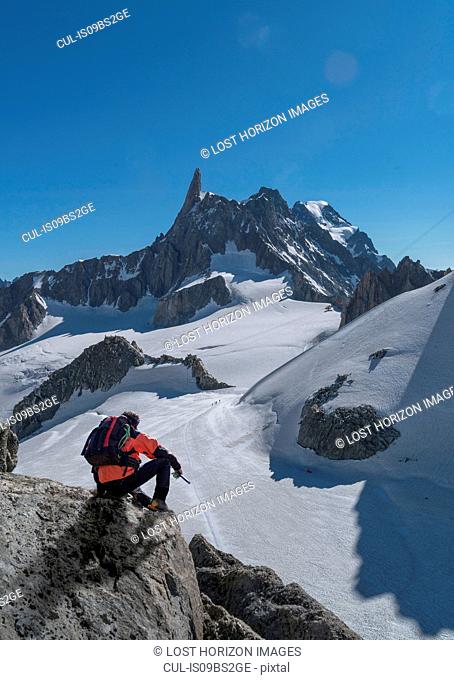 Hiker enjoying scenery, Chamonix-Mont-Blanc, Rhone-Alpes, France