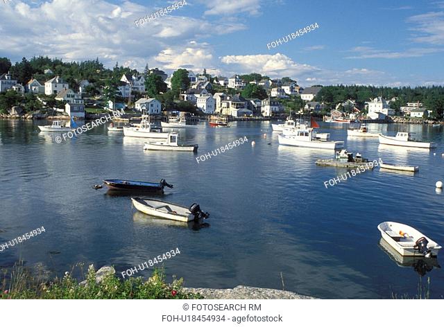 Stonington, ME, Maine, Deer Isle, Lobster boats buoyed in the harbor of the lobstering village of Stonington on Deer Isle on the Atlantic Ocean