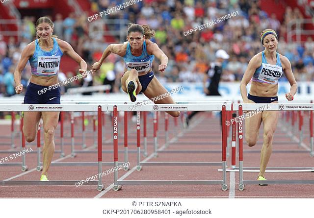 German athlete Pamela Dutkiewicz (center) competes in the women 100 metres hurdles race during the Golden Spike Ostrava athletic meeting in Ostrava