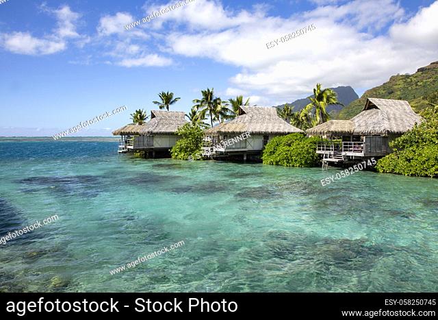 Above water bungalow on stilts with turquoise sea in South Sea