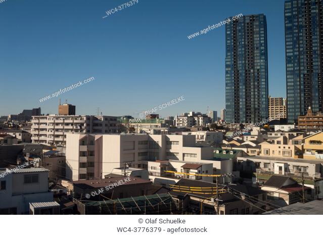 Tokyo, Japan, Asia - An elevated view of residential buildings in the densely populated Greater Tokyo Area between the city of Yokohama and the Japanese capital...