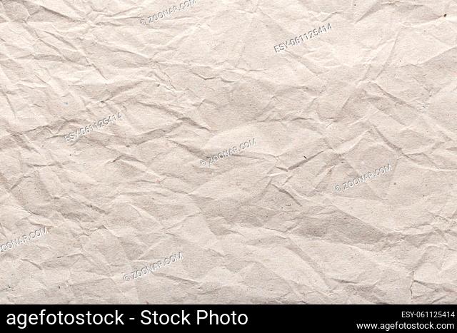 Crumpled paper background texture. Brown paper background