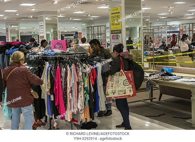 New York, NY/USA-December 15, 2018 Hordes of shoppers scramble for extreme bargains in the Lord & Taylor department store in New York on Saturday, December 15