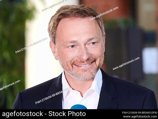 06 June 2021, Berlin: Christian Lindner, Federal Chairman of the FDP, is happy in the Hans-Dietrich-Genscher-Haus after the first positive projections for his...