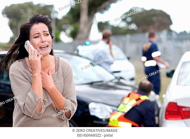 Woman crying after car accident