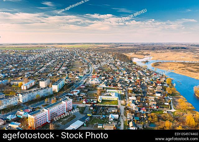 Dobrush, Gomel Region, Belarus. Aerial View Of Dobrush Cityscape Skyline In Spring Evening. Residential District And River In Bird's-eye View