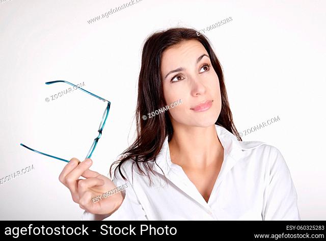 nachdenkliche Geschäftsfrau   pensive young businesswoman with glasses