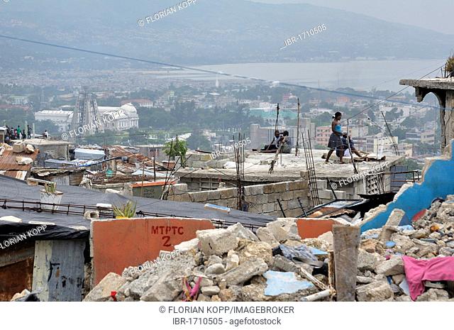 Rubble in the slums of Fort National, the district was largely destroyed by the earthquake in January 2010, in the back left the destroyed presidential palace