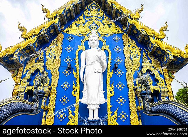 White Buddha at the Blue Temple (Wat Rong Suea Ten or Temple of the Dancing Tiger) in Chiang Rai, Thailand, Asia. Blue is symbolically associated with purity