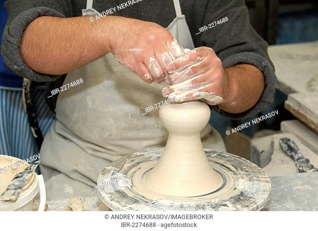 Potter working in a pottery, Mugla Province, Turkey