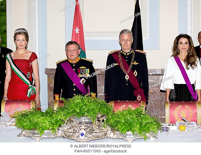 King Philippe (2nd R) and Queen Mathilde (L) of Belgium host an state banquet for King Abdullah and Queen Rania of Jordan in the Royal Palace in Brussels