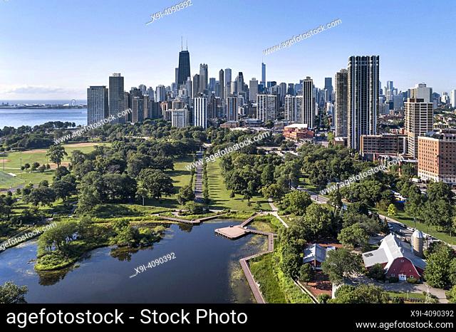 Aerial view of the south pond at Lincoln Park Zoo looking south towards downtown Chicago during a clear summer morning