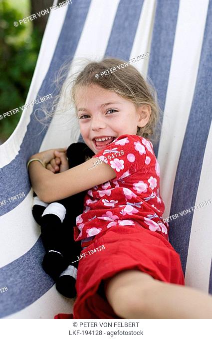 Girl, 4-5 years, in a hammock