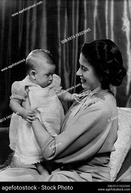 H.R.H. Princess Elizabeth And Prince Charles :First informal photograph of H.R.H. Princess Elizabeth at play with her infant son