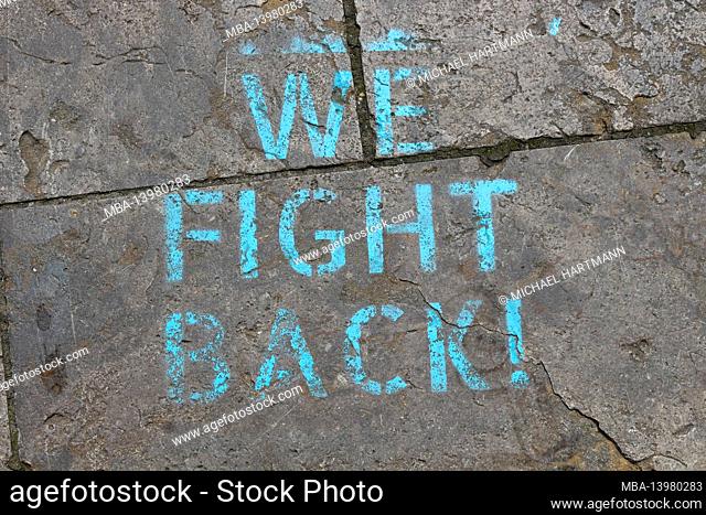 WE FIGHT BACK | Talked saying on the floor of the city center