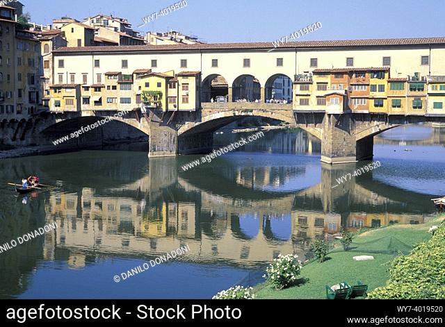 arno river and ponte vecchio, florence, italy