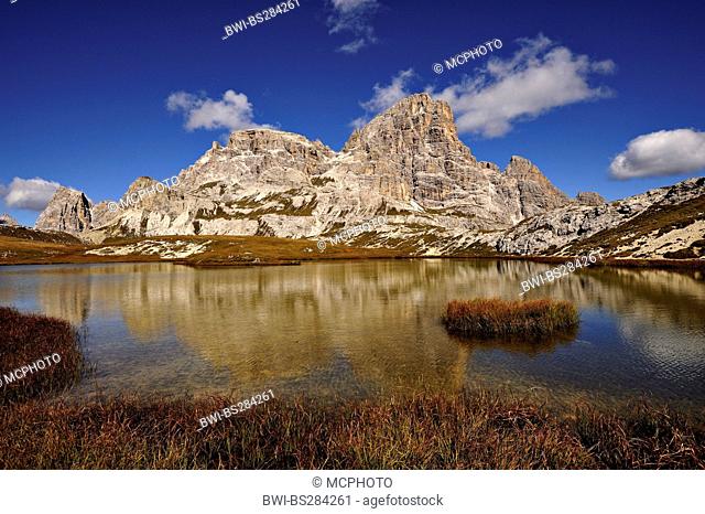 Scarperi mountain range reflecting in a lake, Italy, Dolomites, NP Sesto Dolomites