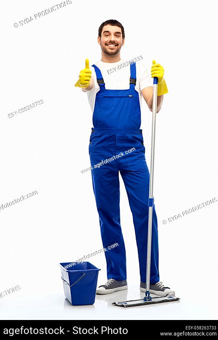 man cleaning with mop and bucket showing thumbs up