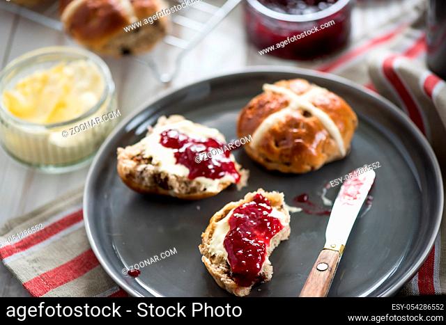 Serving fresh homemade scones with cream and jam