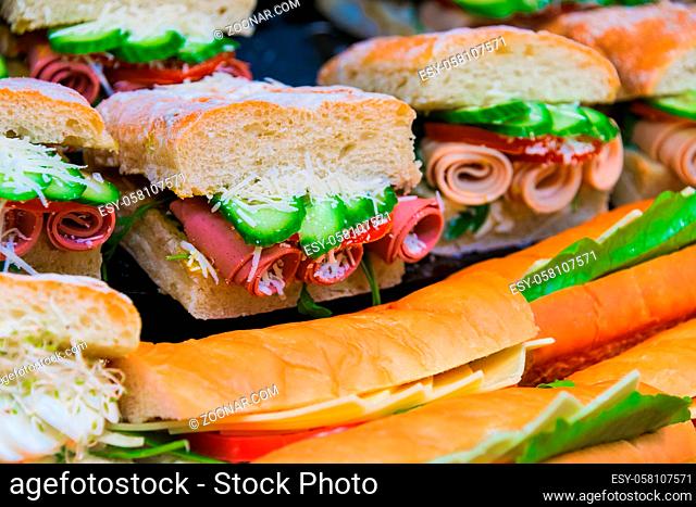 Sandwiches with vegetables and ham sold in fast food restaurant