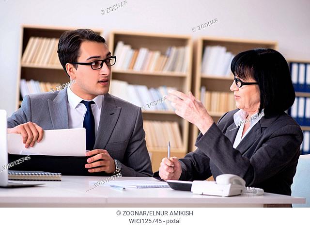 The business couple having discussion in the office