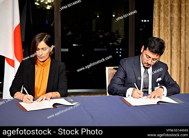 Trusted Corporation's Fariza Abidova and Director Newlinks Global Oybek Shaykhov pictured during a signing ceremony in Tokyo