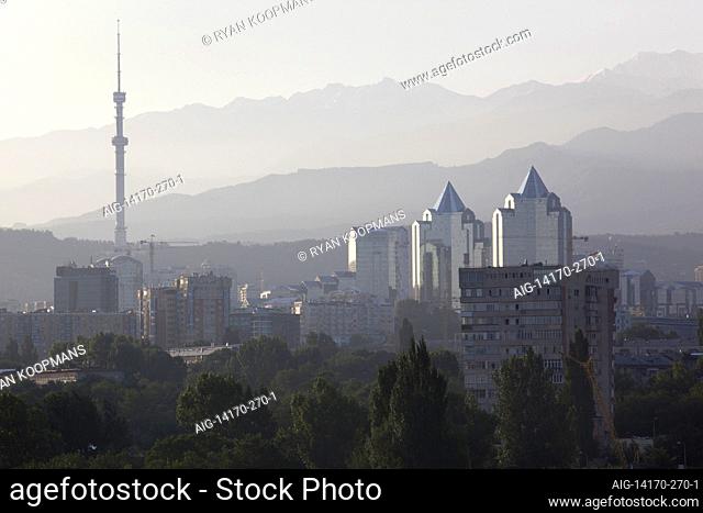 Cityscape and mountains overlook Business Center Nurly Tau in Almaty, the former capital of Kazakhstan