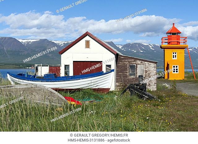Iceland, North East Iceland, Akureyri, Svalbardseyri, orange lighthouse, building, boat