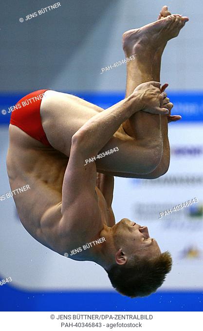 Oliver Homuth from Ukraine jumps off the one metre board during the men's diving finale at the European Diving Championships in Rostock, Germany, 19 June 2013