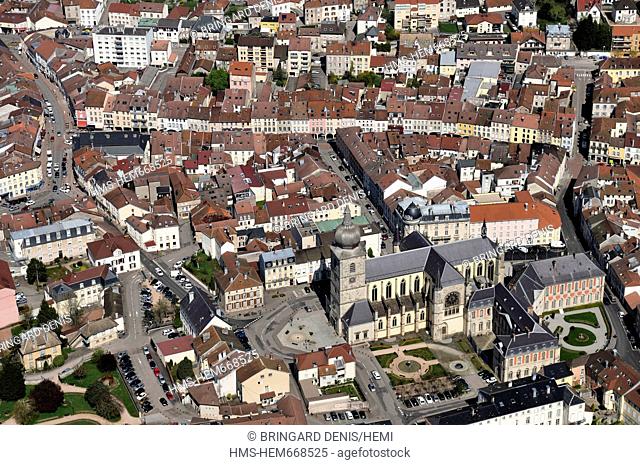 France, Vosges, Remiremont, the downtown, the houses has arches street de Gaulle, Abbey church of St Pierre, the Palace, in April aerial view