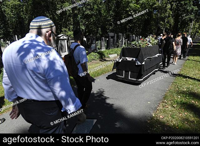 Rabi Karol Sidon (left) was among the people, who give last farewell to Viktor Wellemin New Jewish cemetery in Prague, Czech Republic, on Friday, August 21